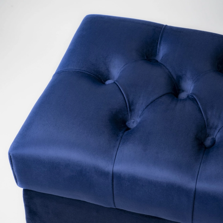 Élégant pouf matelassé bleu marine avec rangement