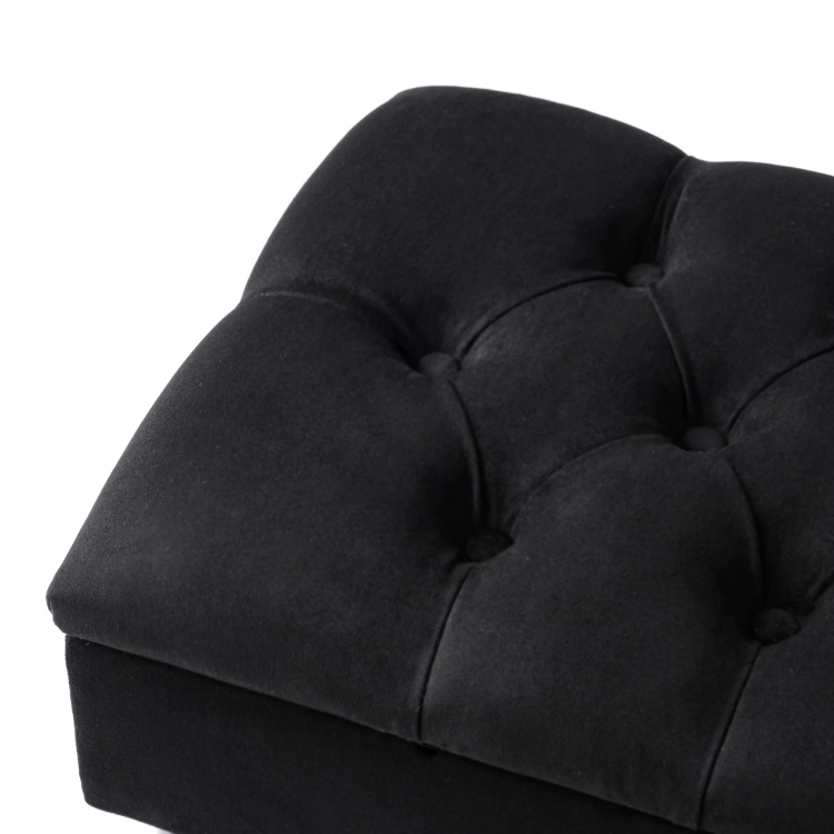 Pouf de rangement matelassé noir sur pieds en métal
