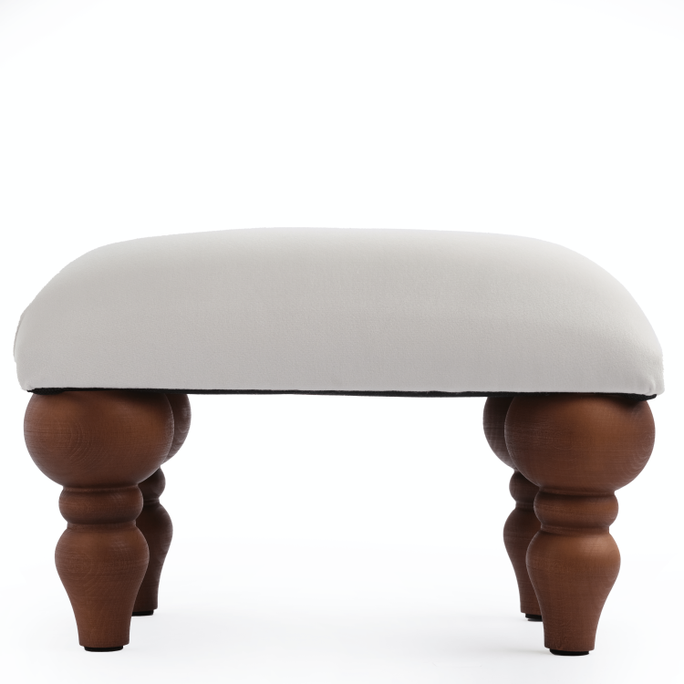 Repose-pieds pour fauteuil en blanc, meuble pratique et esthétique