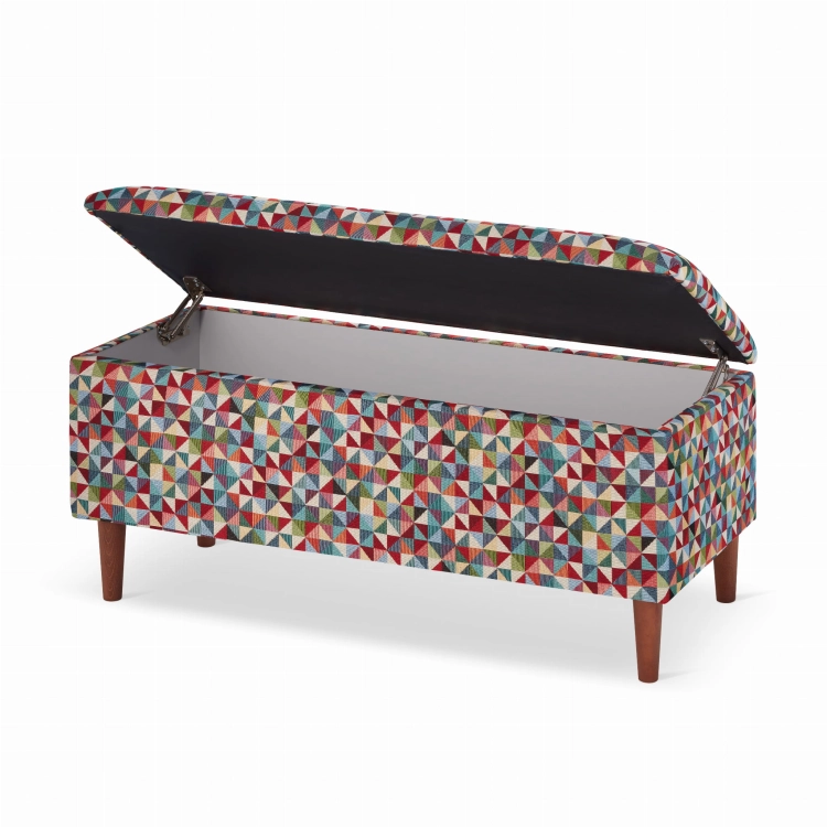 un pouf avec rangement aux motifs géométriques