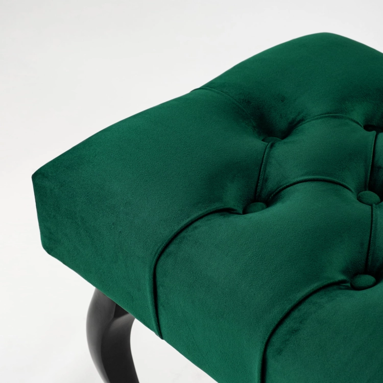 Banc matelassé vert bouteille avec pieds noirs