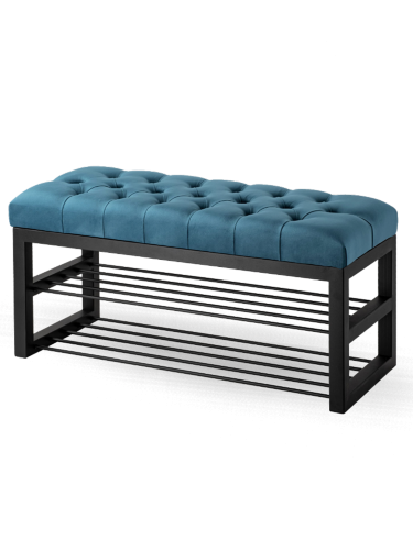 Blaue gepolsterte Bank im Industriestil mit Metallregalen