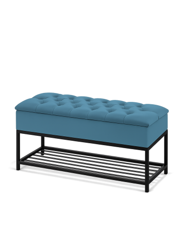 Un pouf matelassé avec rangement en vert d'eau, parfait pour les intérieurs de style industriel.