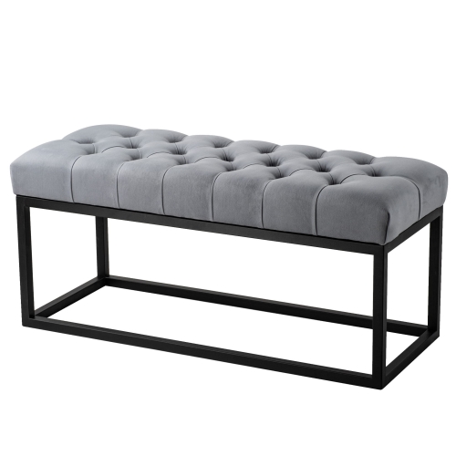 Banc matelassé de couleur grise sur pieds en métal